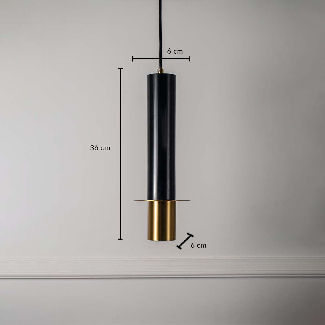 Black and gold cylindrical pendant ceiling light with height 36 cm and diameter 6 cm displayed on off white background.