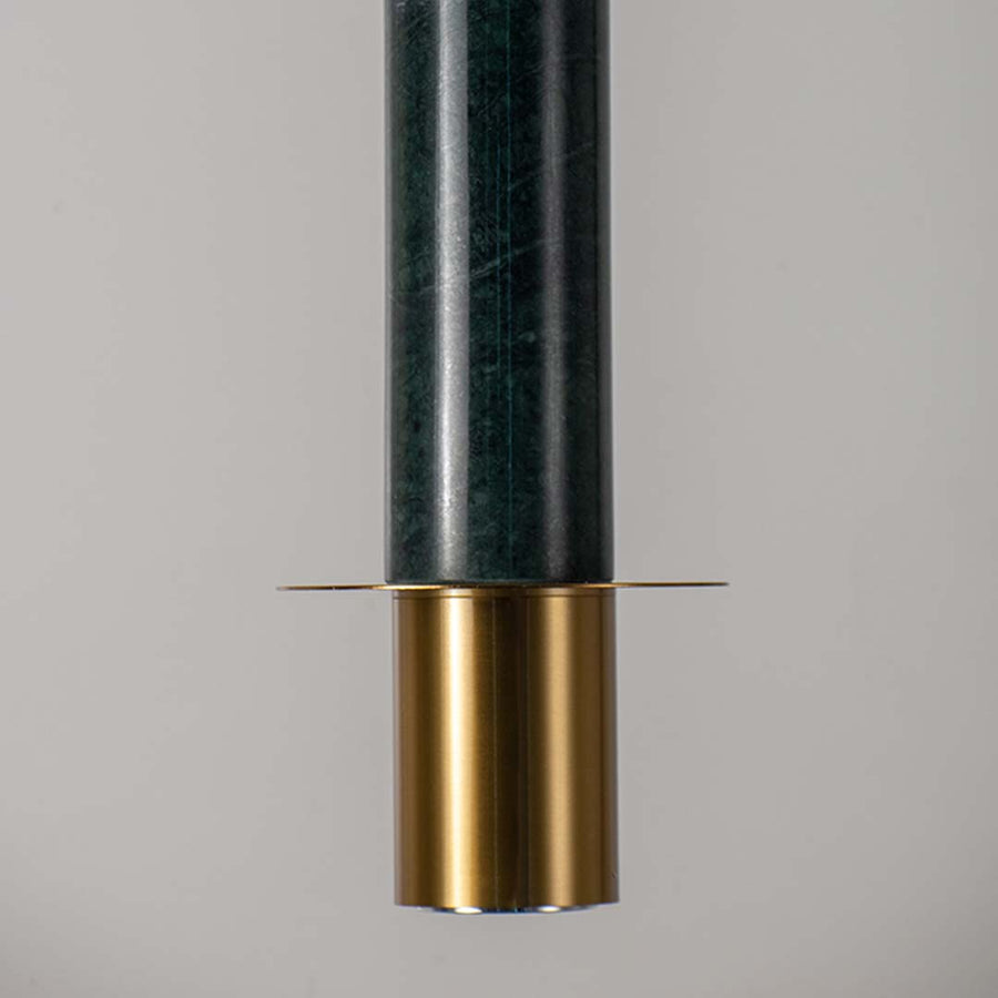 Contemporary pendant lamp with green marble cylindrical body and brass gold base crafted for dining bedroom and hallway use.