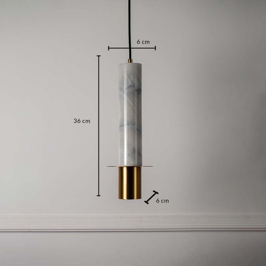 Pendant light with white marble cylindrical body 36 cm height and 6 cm width featuring brass gold base for interiors.
