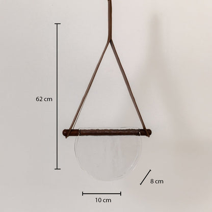 Pendant light with clear half-moon textured glass shade showing labeled dimensions: 62 cm height 10 cm width and 8 cm depth.