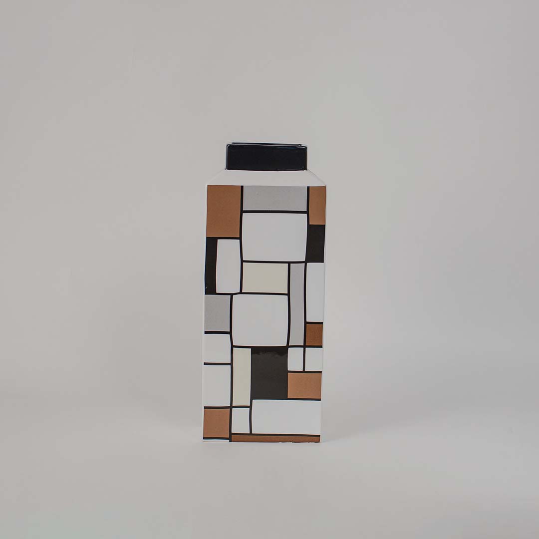 Handcrafted ceramic vase featuring geometric square design in black brown and white ideal for modern home decoration.