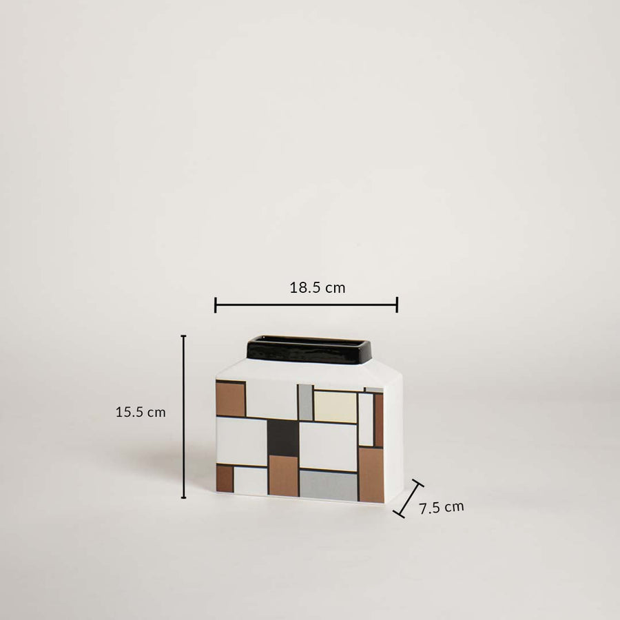 Geometric ceramic vase shown with dimensions 15.5 cm height 18.5 cm width and 7.5 cm depth clearly displaying product size.