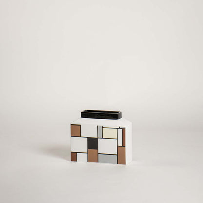 Modern wide rectangular ceramic vase with an abstract geometric block grid pattern on white background for art decor.