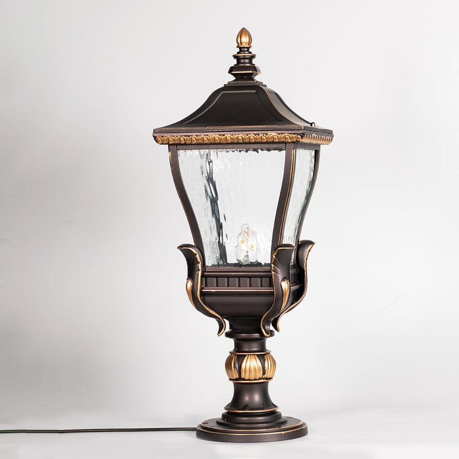 Antique black outdoor gate light with clear glass shade for elegant exterior decor styling use.