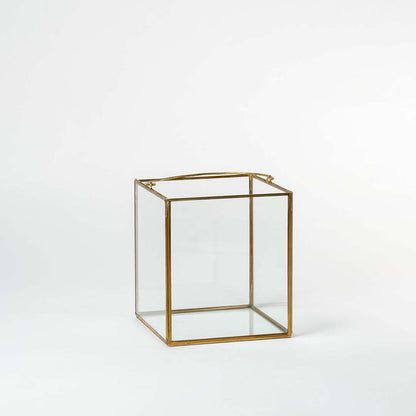 Prism decorative glass box with golden frame shown on white background perfect for storage and stylish home decoration.