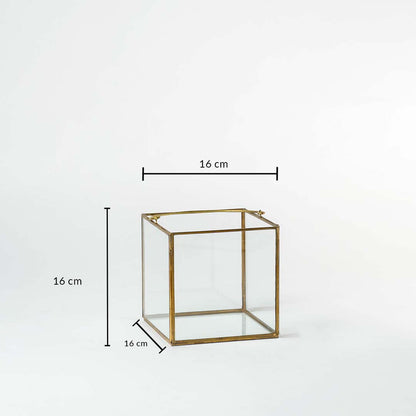 Gold metal cube decor stand showing dimensions 16 cm width 16 cm depth and 16 cm height for tabletop styling.