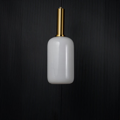 Modern white glass pendant light turned off with golden holder displayed elegantly on black background decor.