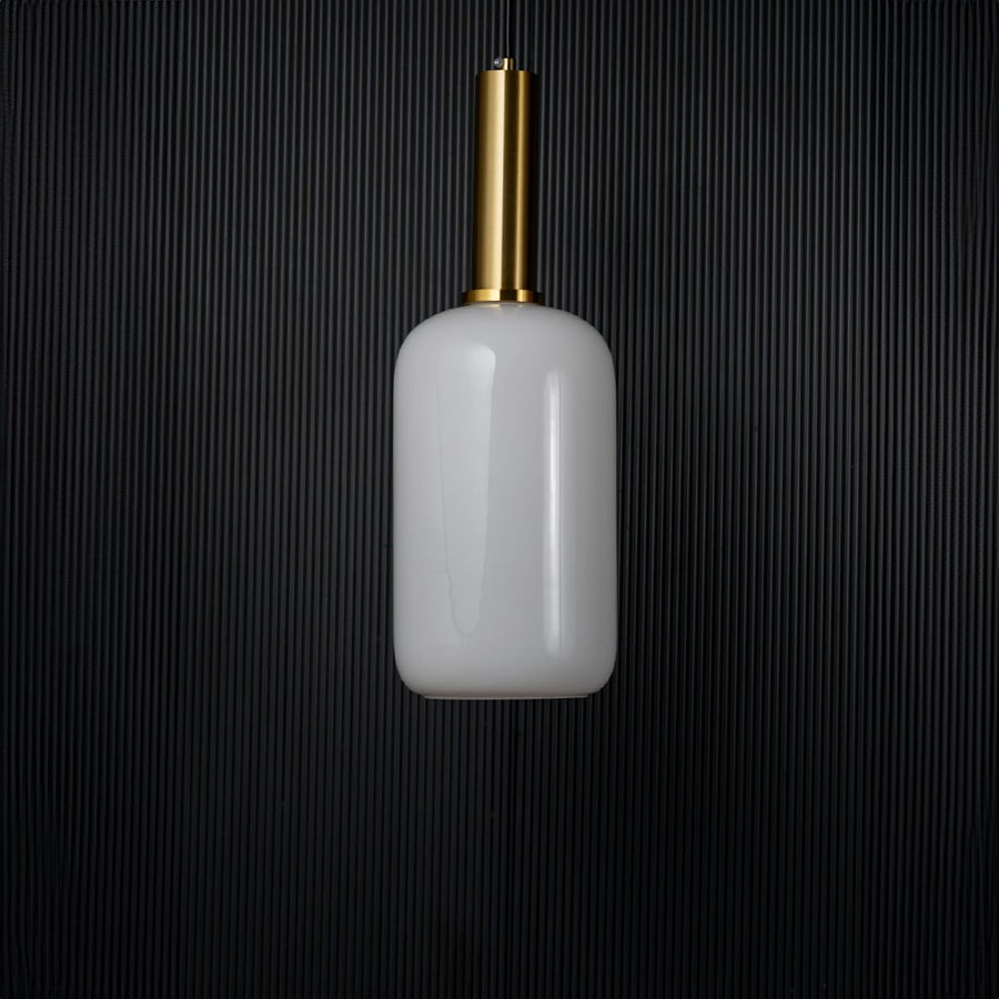 Modern white glass pendant light turned off with golden holder displayed elegantly on black background decor.