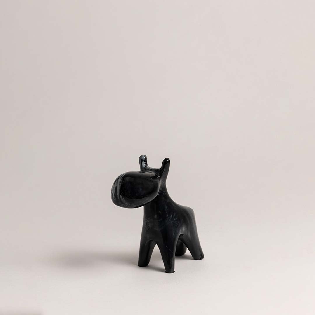 Stylish black ceramic moose figurine with marble swirl texture displayed on white background for elegant decor.