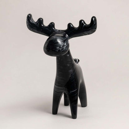 Marble textured black moose figurine displayed on white background for modern home decor and elegant interiors.