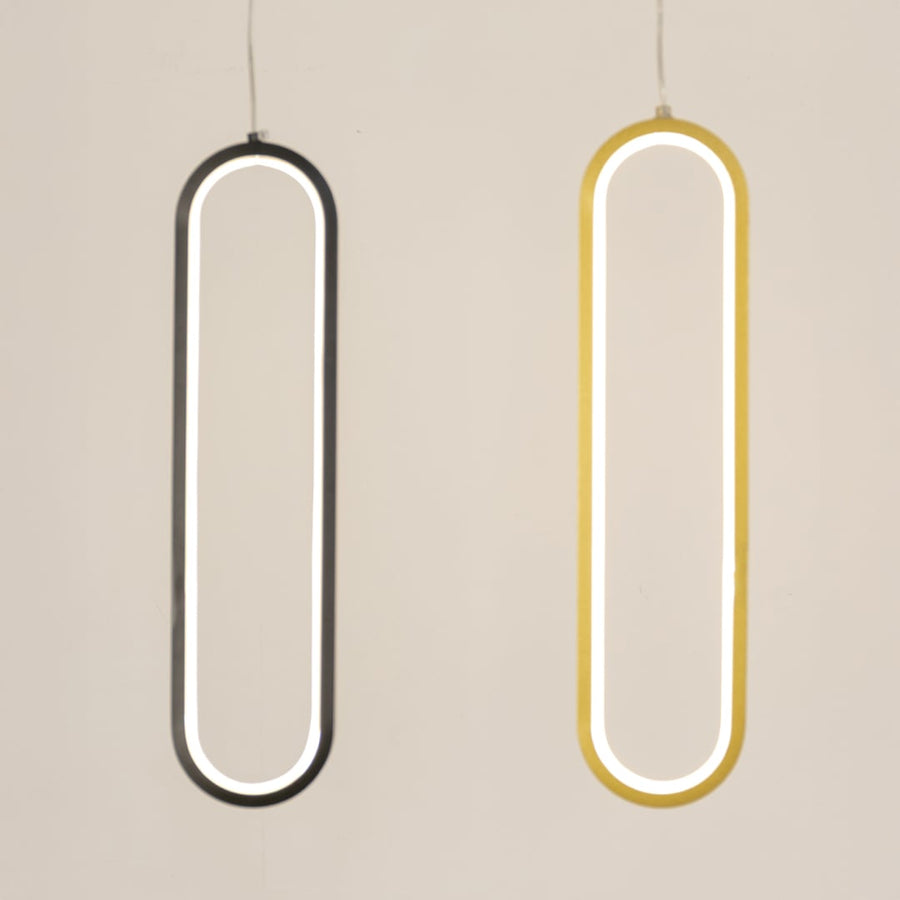 Set of modern metal elongated loop hanging lights in black and white shown together for creative wall decor styling.