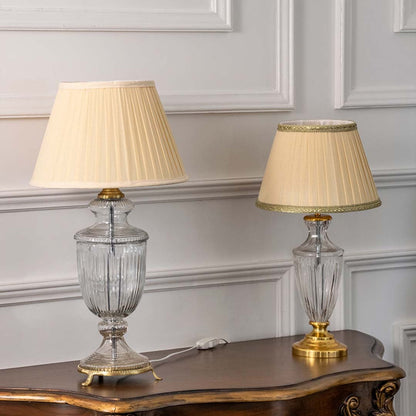 Crystal glass table lamps with pleated fabric shades and gold accents styled for timeless luxury home interiors.