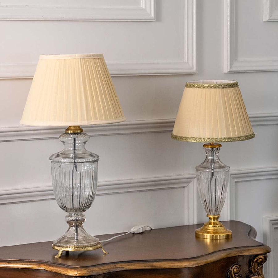 Crystal glass table lamps with pleated fabric shades and gold accents styled for timeless luxury home interiors.