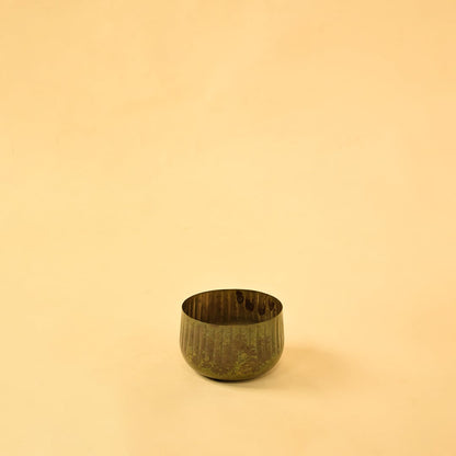 Bronze ribbed metal bowl planter on a clean white background suitable for modern simple and natural home styling.