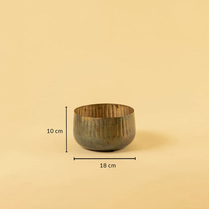 Ribbed metal bowl planter with 10 cm height and 18 cm width ideal for shelves tables and modern rustic decor.