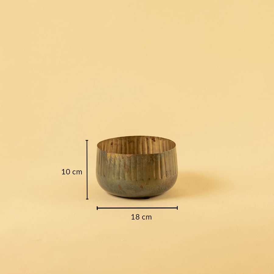 Ribbed metal bowl planter with 10 cm height and 18 cm width ideal for shelves tables and modern rustic decor.
