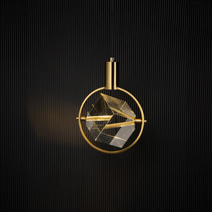 Crystal pendant light glowing on black background with elegant golden frame and clear cube design for interiors.