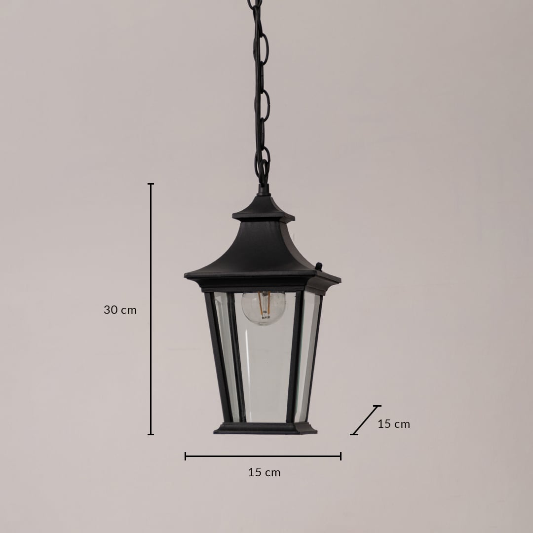 Black metal hanging lantern with clear glass panels shown with 30 cm height and 15 cm width measurements for size clarity.