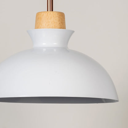 Closeup of white dome pendant ceiling light with wooden top showing glossy finish for modern kitchen dining and cafe lighting decor.