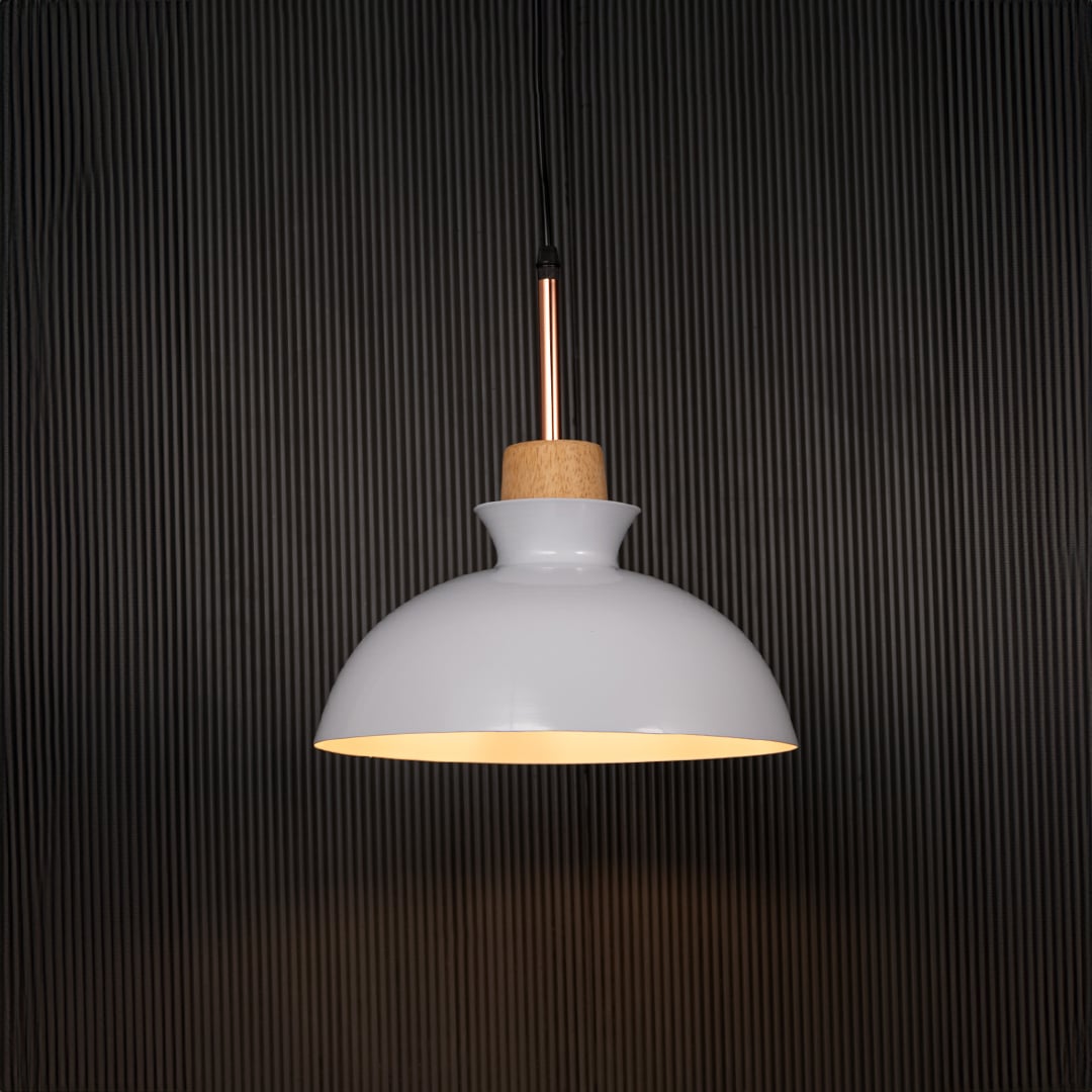 White dome pendant ceiling light with wooden accent illuminated on back background for dining room cafe and modern interior lighting.