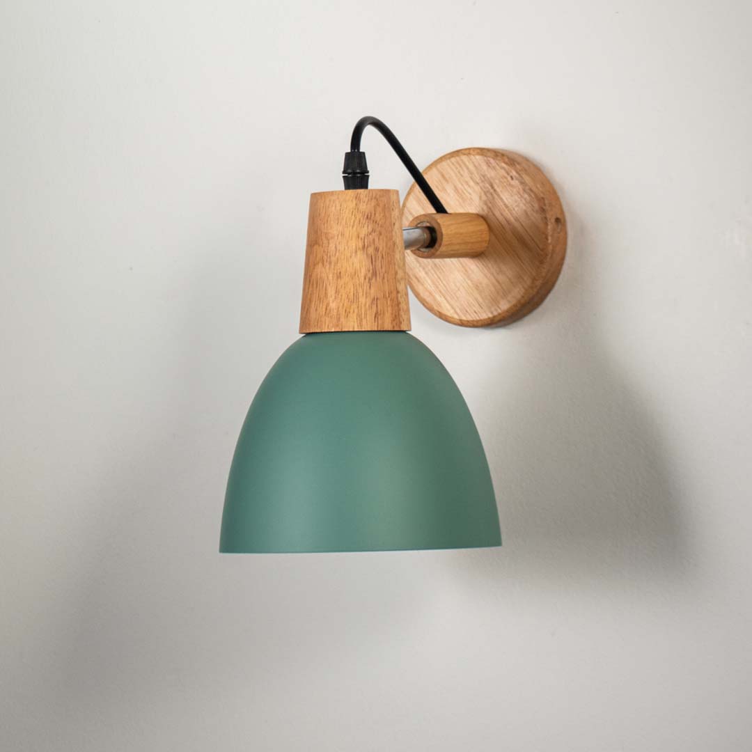 Elegant wall lamp with matte green metal shade wooden base and black cord suitable for living room bedroom and hallway walls.