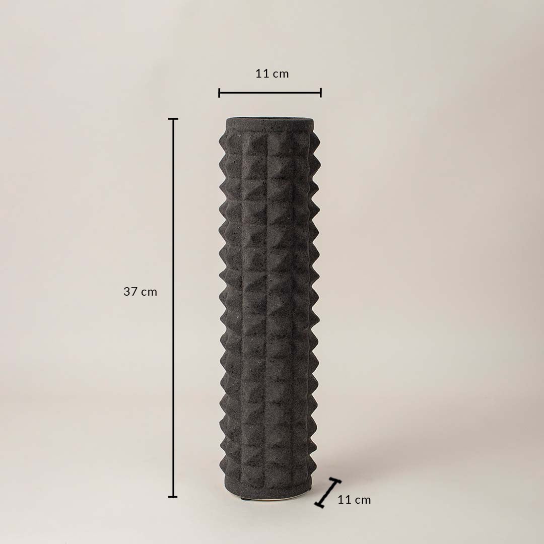 Black ceramic textured vase with cylindrical design showing 37 cm height and 11 cm width on white background dimension view.