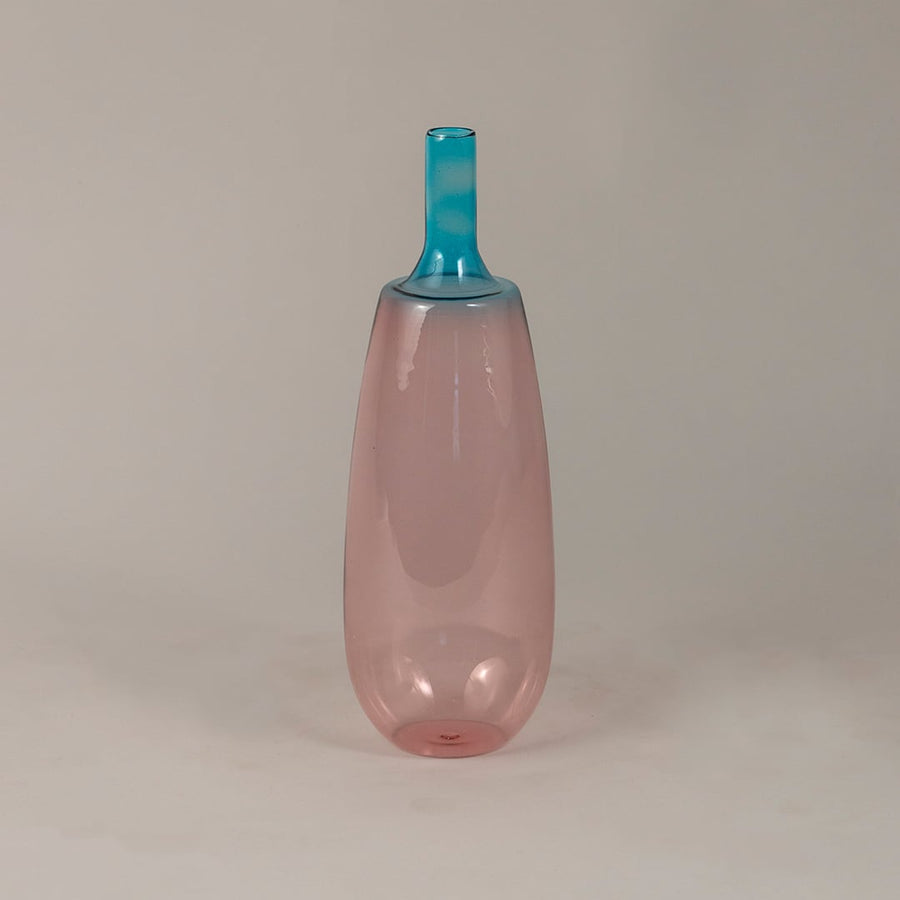 Gradient pink blue glass vase with glossy surface suitable for minimal home or studio interior decor.
