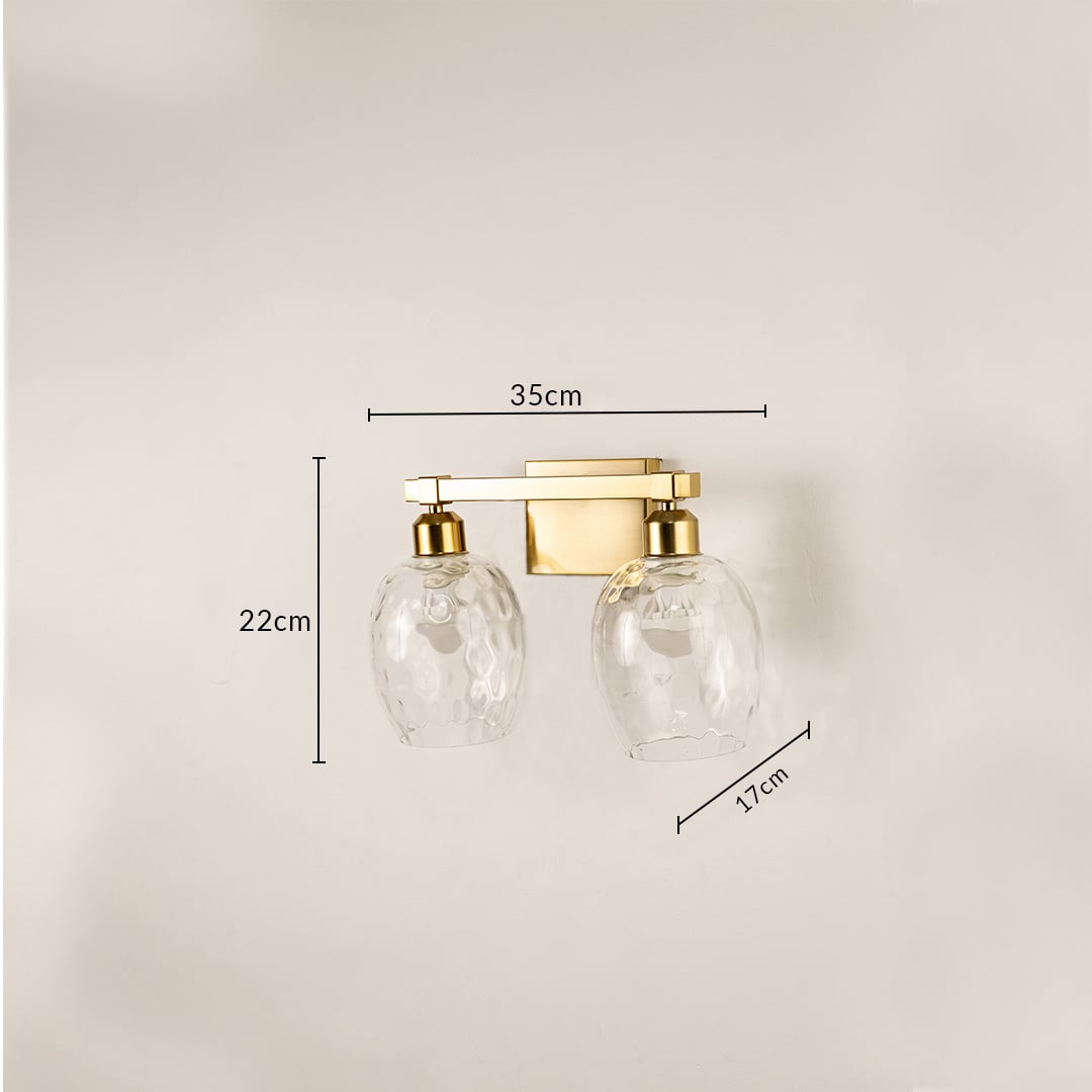 Brushed gold double wall light with hammered glass shades measuring 22 cm height 35 cm width and 17 cm depth shown for accurate placement.