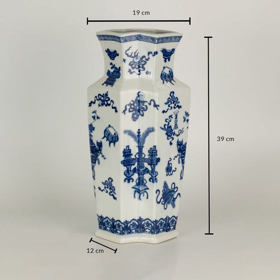Blue and white ceramic decorative vase with floral artwork showing product dimensions for elegant home decor displays.
