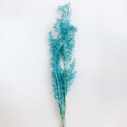 Decorative preserved turquoise foliage branch with delicate leaves ideal for modern vase decor floral arrangements and styling.