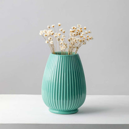 Delicate dried white flower stem styled for minimal home decor adding soft natural texture to modern interior settings.