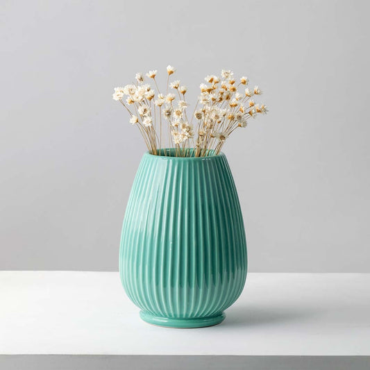 Delicate dried white flower stem styled for minimal home decor adding soft natural texture to modern interior settings.