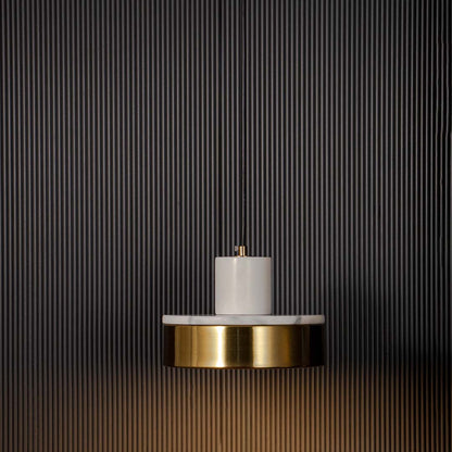 White marble and gold pendant light glowing warmly with modern design displayed on black background for luxury home decor.
