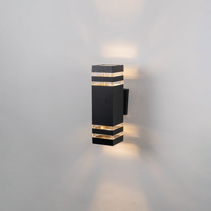 Black metal outdoor wall light with geometric beam lighting for stylish modern exterior wall decor.