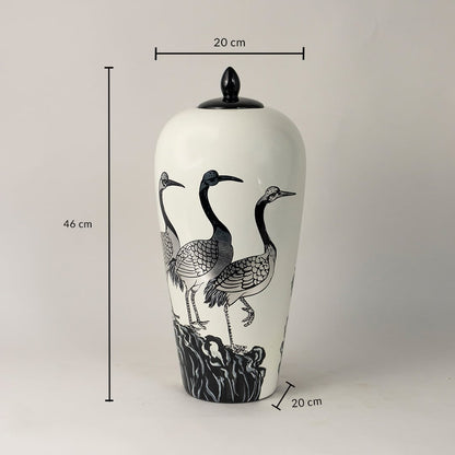 Round ceramic jar measuring 28 cm in height and 23 cm in width with elegant floral and butterfly design.