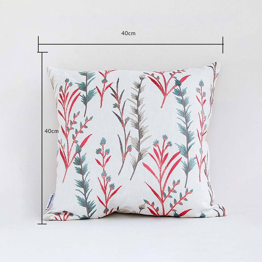 Botanical cushion cover with red and green leafy pattern presented with dimension markers showing its 40 cm x 40 cm size perfect for vibrant home décor styling.