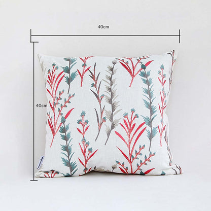 Botanical cushion cover with red and green leafy pattern presented with dimension markers showing its 40 cm x 40 cm size perfect for vibrant home décor styling.