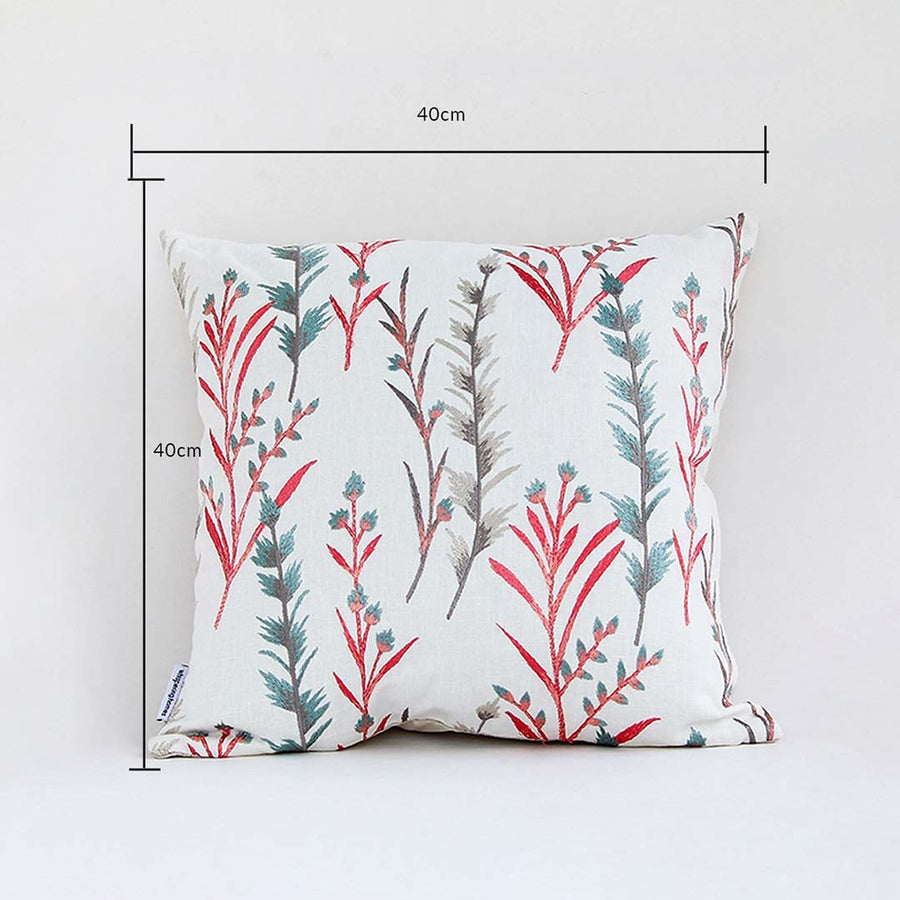 Botanical cushion cover with red and green leafy pattern presented with dimension markers showing its 40 cm x 40 cm size perfect for vibrant home décor styling.