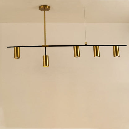 Sleek gold linear chandelier illuminated on white background showcasing minimalist design perfect for dining tables and modern interiors.