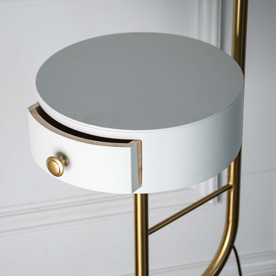 Closeup view of the elegant green floor lamp showcasing its unique design and gold accent.