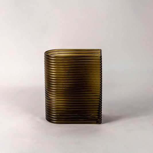 Elegant ribbed glass vase smoke brown tone rectangular curved shape modern style light on white background for living room decor.