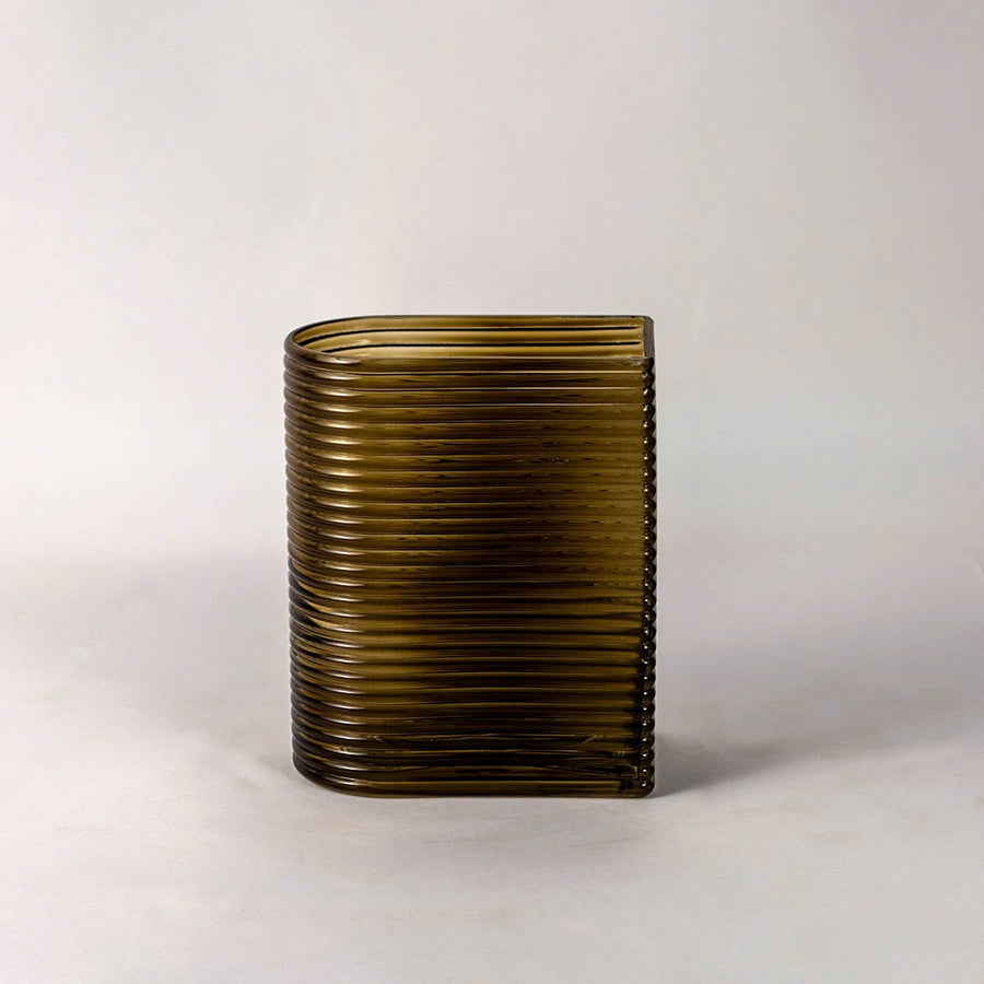 Elegant ribbed glass vase smoke brown tone rectangular curved shape modern style light on white background for living room decor.