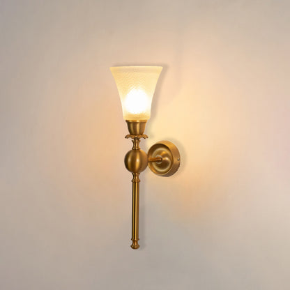 Gold metal wall light with frosted glass shade on white background ideal for bedroom hallway and living room lighting.