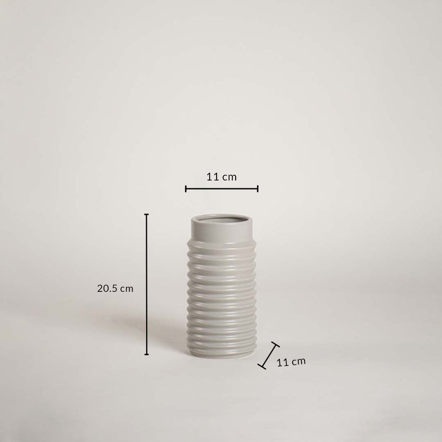 Light grey ribbed ceramic vase with 20.5 cm height and 11 cm width shown clearly for accurate home decor size reference and planning.