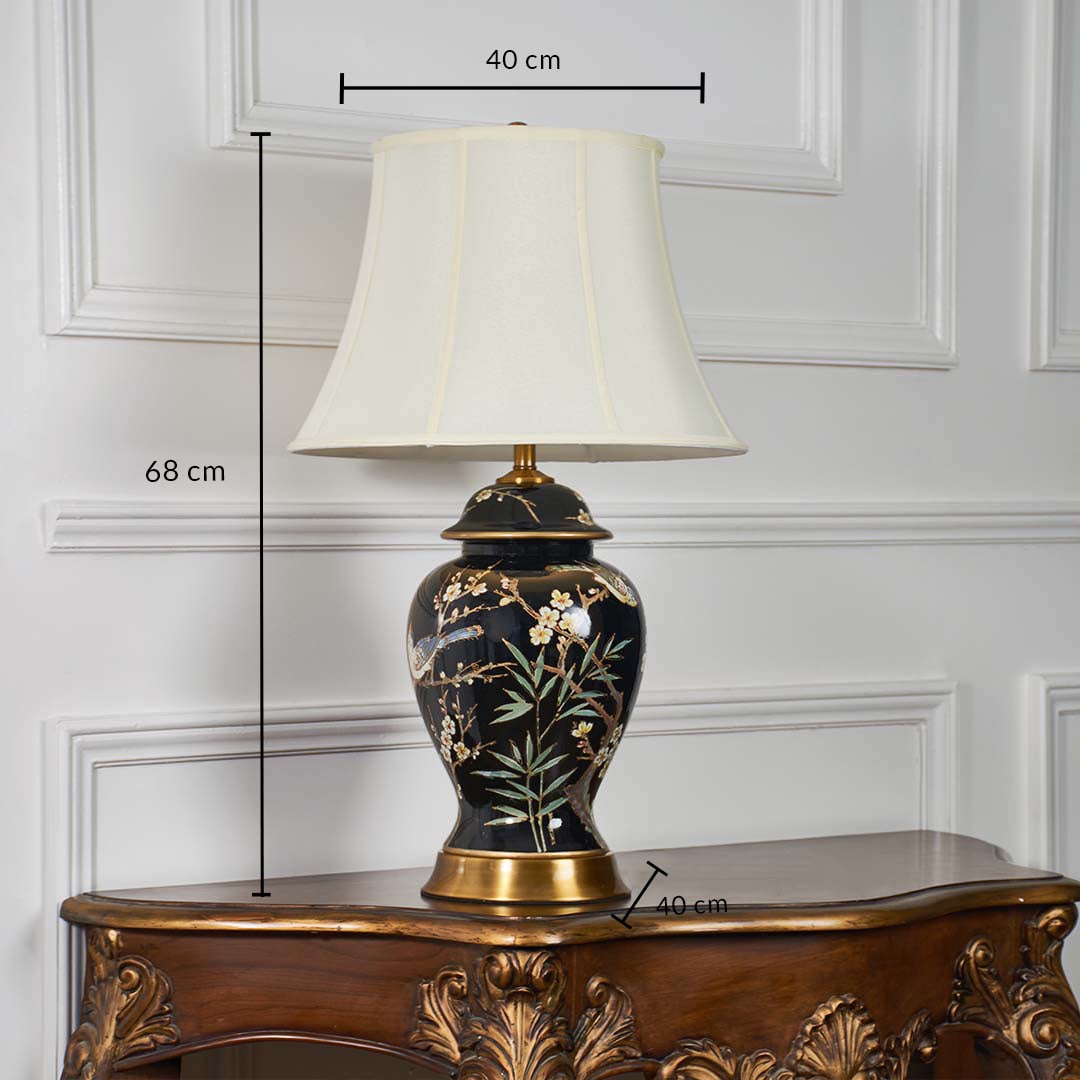 Black ceramic table lamp with beige shade shown on a white background with height 68 cm and width 40 cm for clear accurate size reference.