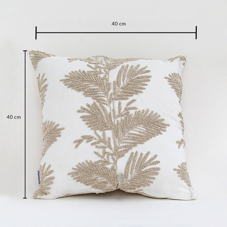 Soft cotton cushion cover with beige floral embroidery shown with visible dimensions of 40 cm by 40 cm providing an elegant nature inspired décor element with a breathable soft skin friendly texture.