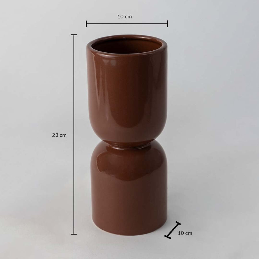 Brown ceramic vase with 23 cm height and 10 cm width displayed on white background for decor size reference.