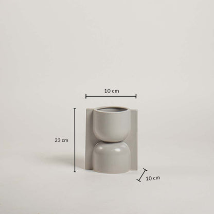 Light grey geometric ceramic vase with 23 cm height and 10 cm width shown clearly for accurate home decor size reference and planning.