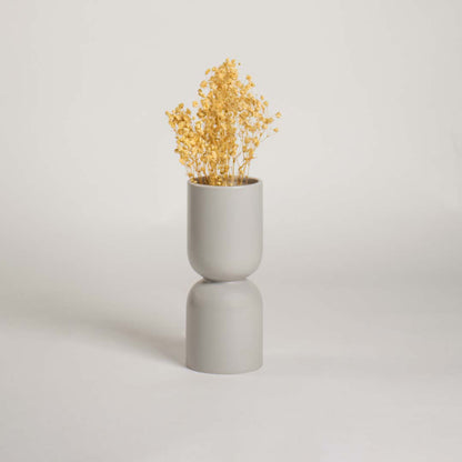 Modern light grey double form ceramic vase shown on a plain white background perfect for simple elegant home decor accents.