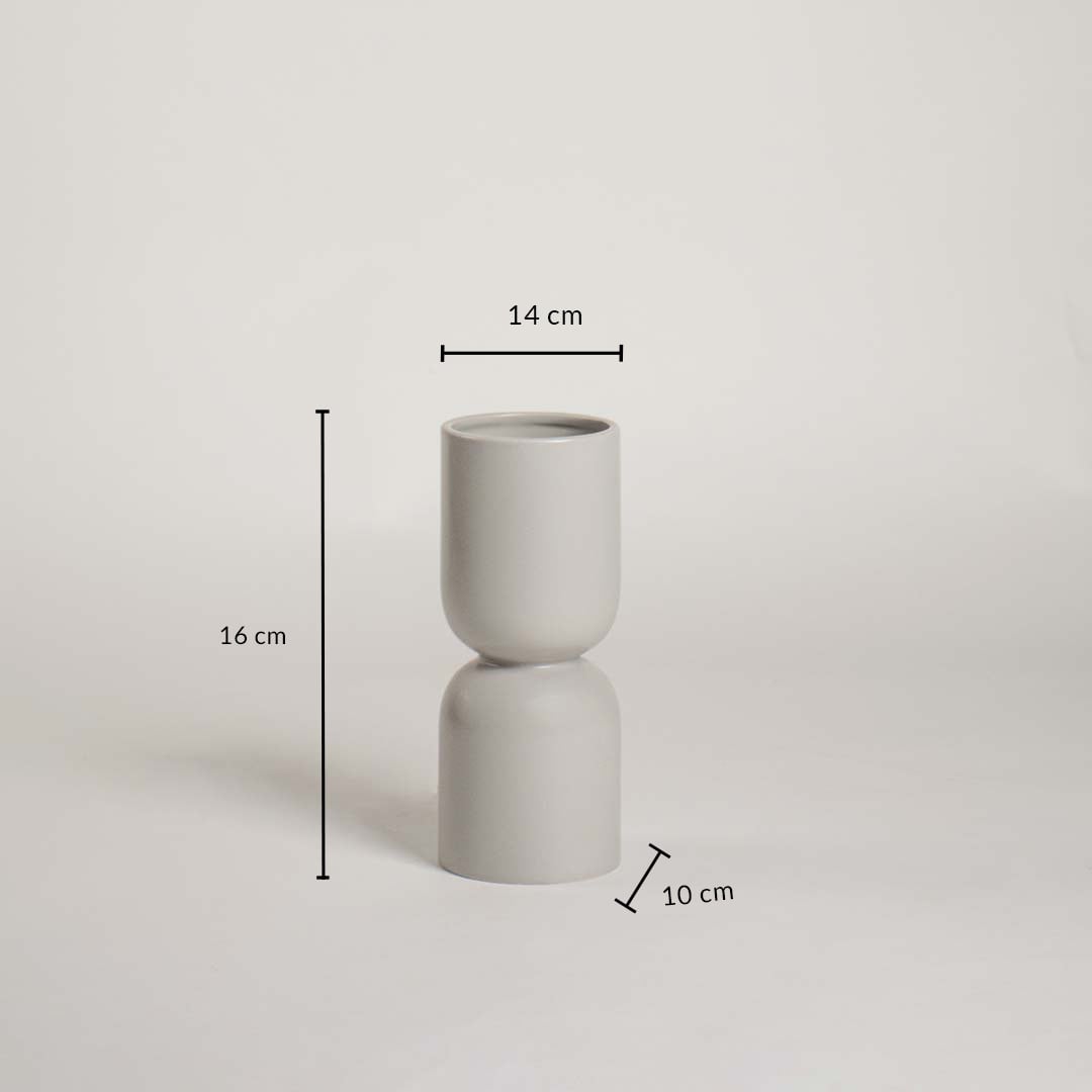 Light grey ceramic vase with sculptural shape and 16 cm height and 14 cm width shown clearly for accurate decor size reference.